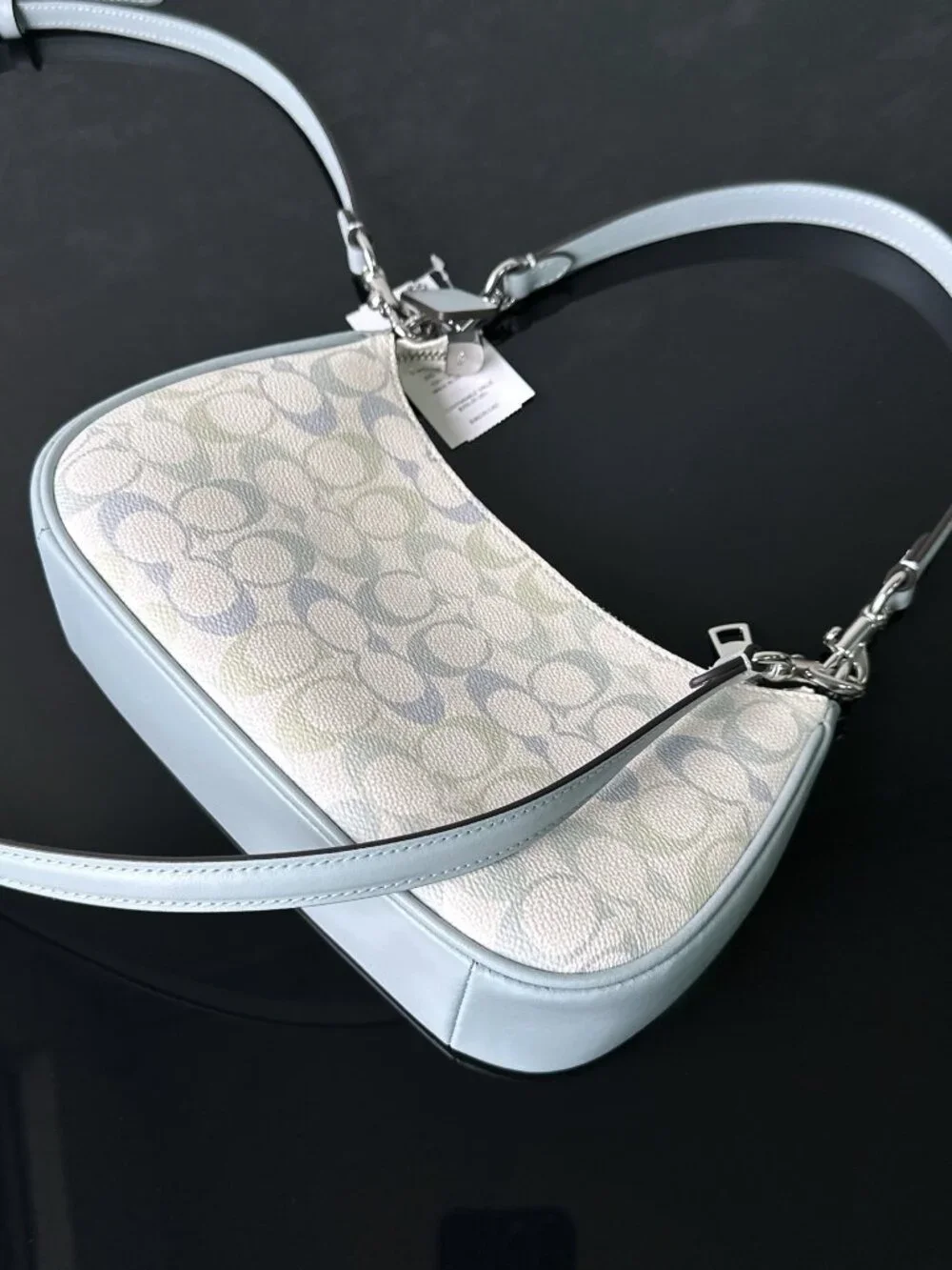 Coach signature coated‑canvas
